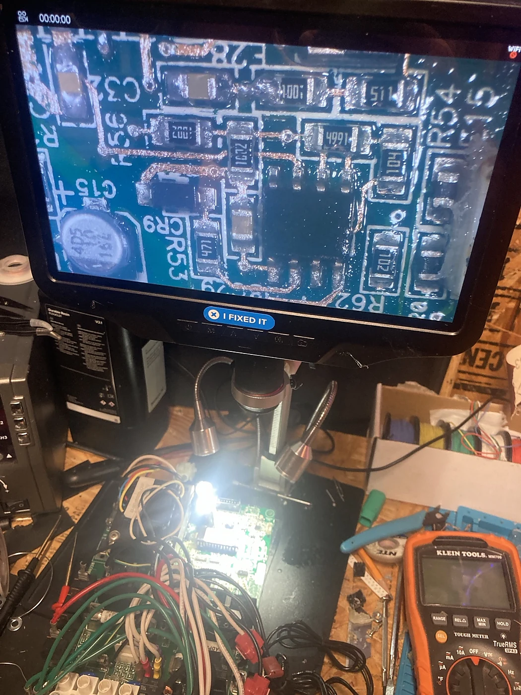 Circuit board diagnostic work under a digital microscope