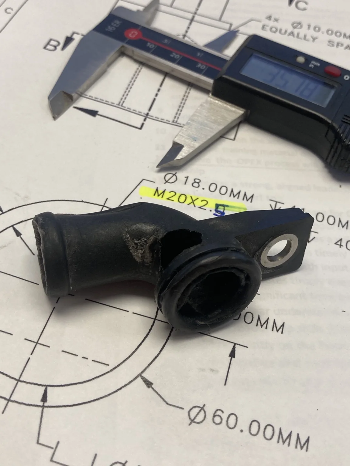 Damaged original coolant elbow used to develop the GEN II replacement